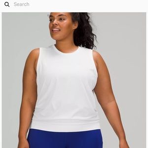 Lululemon white swiftly relaxed muscle tank top. Size 4